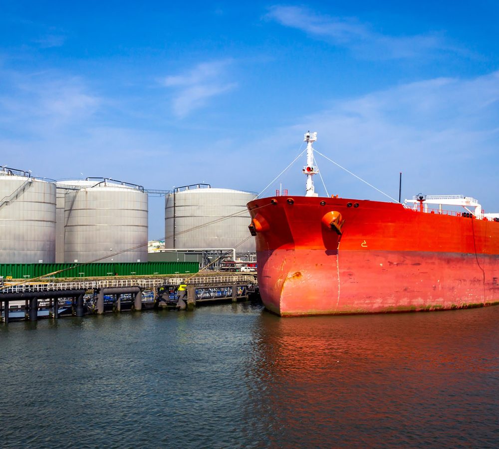 Crude,Oil,Tanker,Docked,At,A,Oil,Storage,Silo,Terminal Crude,Oil,Tanker,Docked,At,A,Oil,Storage,Silo,Terminal